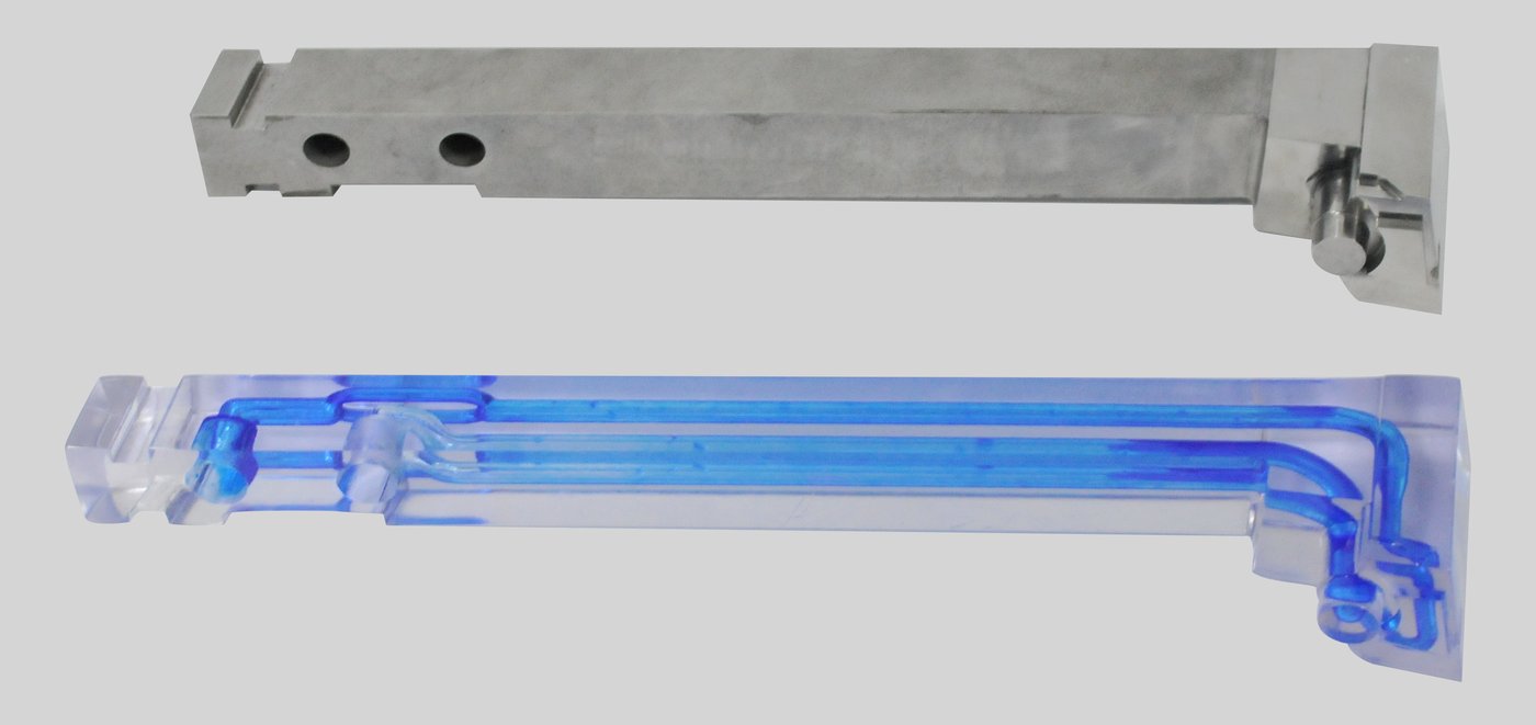 Long mould slide with internal cooling channels, steel and transparent model