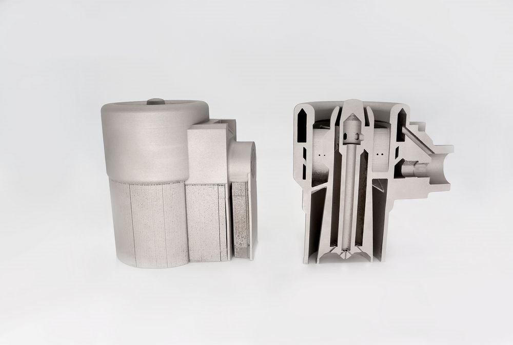 Printed metal valve body, whole part and section showing the internal ports