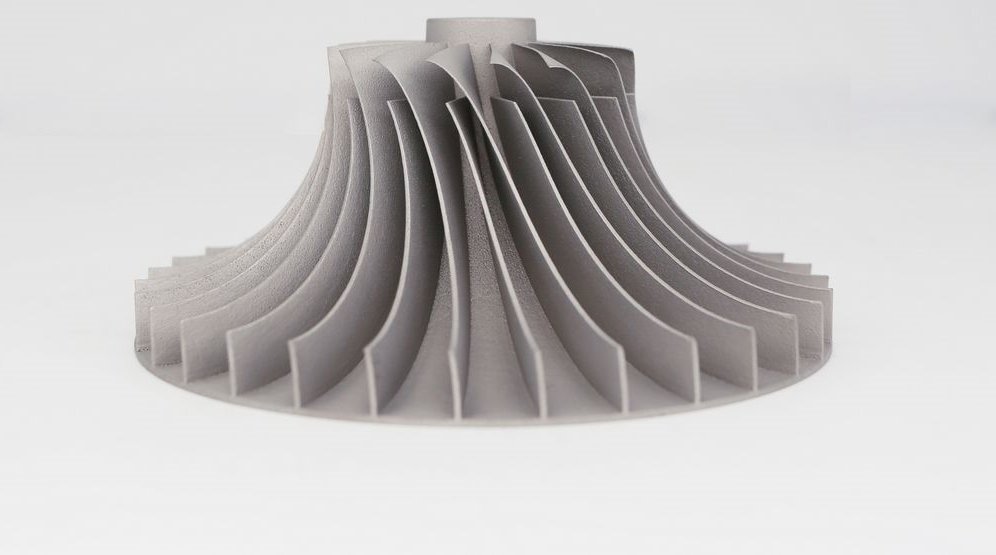 Centrifugal impeller with doubly curved blades printed in metal